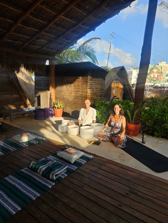 people sitting in front of yoga mats
